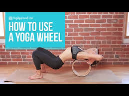 The foundation of all standing poses is mountain pose. How To Use A Yoga Wheel Video Tutorial Youtube
