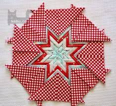 转载 两种三角折叠垫 越南文 英文 kebu手工教程 小宝妈 新浪博客 fabric origami folded fabric ornaments star quilt patterns