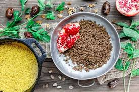 Combine the yogurt and the juice from 1 lemon in a bowl; Couscous Recipe Jeweled With Pomegranate Nuts The Mediterranean Dish