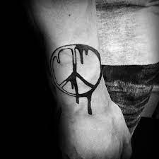 Boys like to have inspirational quotes as tattoos, one that is even challenging death. Top 71 Peace Sign Tattoo Ideas 2021 Inspiration Guide