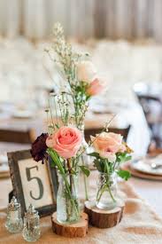 Wedding table name places for wine glasses in wood rustic wedding table decoration. 900 Rustic Wedding Centerpieces Ideas In 2021 Rustic Wedding Centerpieces Rustic Wedding Wedding Centerpieces