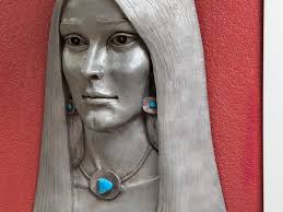 Sold at Auction: Philip Vickers Native American Woman Relief Wall Sculpture  Southwest Resin