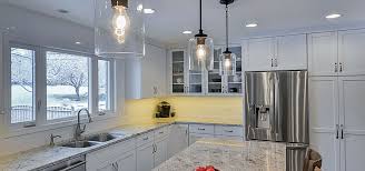 According to lightsonline.com you should space a pendant every 2 feet or so above a kitchen island and pick the right size of pendant to suit your island length. How To Choose The Right Kitchen Island Lights Luxury Home Remodeling Sebring Design Build