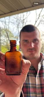 Vintage bottle discoveries by grandfather and grandsons in the midwest