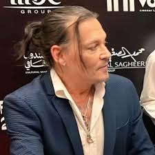 look in the mirror" Johnny: "oh Christ"