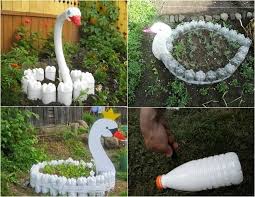 White Swan Garden Bed Made Of Recycled Plastic Bottles Recycle Plastic Bottles Plastic Bottle Crafts Reuse Plastic Bottles