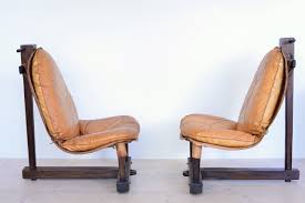 These chairs are comfortable and look great whether you are sitting next to the fireplace or campfire. Brazilian Tropical Wood And Cognac Leather Lounge Chairs 1960s Set Of 2 For Sale At Pamono