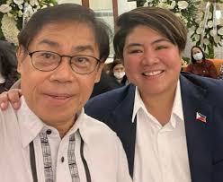 Migrant Workers Secretary Hans Leo J. Cacdac administers the oath of office  to Jasmine B. Gapatan, the newly appointed Deputy Administrator of the  Overseas Workers Welfare Administration (OWWA), in a simple ceremony