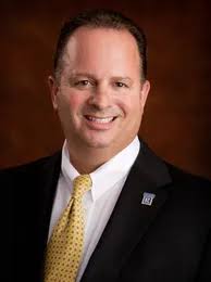 Marc I DeContreaus, Agent