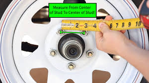 For a 4 lug wheel, measure center to center of two holes directly across from each other. How To Measure A 5 Lug Trailer Wheel Bolt Pattern Youtube