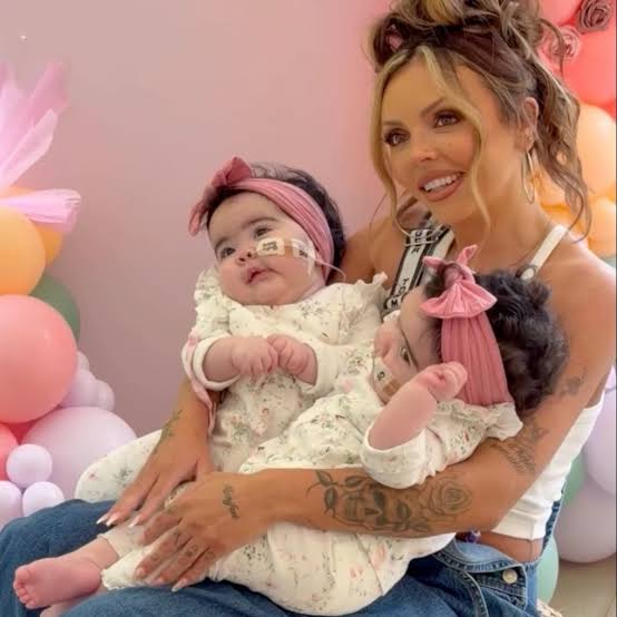 Jesy Nelson gives twins physio in sweet snap amid heartbreaking health  battle - The Mirror