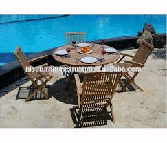 The solid teak table and chairs can be folded to save space when not in use. Round Teak Wood Folding Dining Arm Chairs And Folding Table Set Furniture Indonesia Otherhomefurniture Buy Otherhomefurniture Chairs Outdoor Furniture Product On Alibaba Com