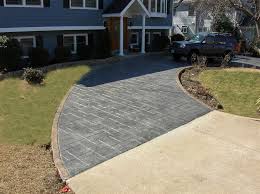 This is another material that resembles the look of natural stone without being actual stone. Stamped Concrete Driveway Ashlar Slate Pattern Sun Gray Color With Border Traditional Entry Dc Metro By Salzano Custom Concrete Houzz