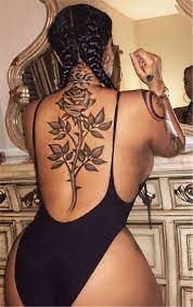 Pin On Lower Back Tattoos For Girls