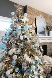 A collection of the top 28 images about silver and gold christmas tree decorations including images, pictures, photos, wallpapers, and more. My Favorite Things Blue Silver Rose Gold Christmas Tree The Diy Mommy