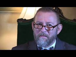 Erwin Bell, president of the Saginaw Valley Torch Club, talks about Torch  Club