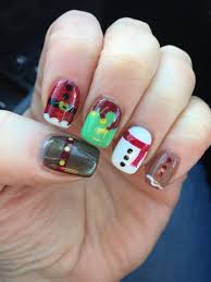 Christmas Nails With Reindeer Santa Elf Snowman And Gingerbread Man Santa Nails Cute Christmas Nails Nails