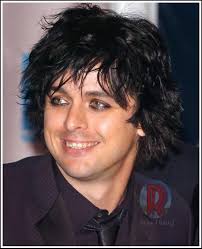 Messy hair, black eyeliner, and that killer smile — deadlier than any lyric  he's ever sung. Fan challenge, Describe Billie in one line ...?