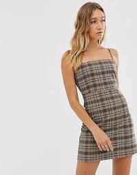 Maybe you would like to learn more about one of these? Monki Check Mini Dress With Spaghetti Strap In Brown Asos