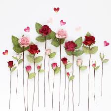 Curl the tips of the petals outwards, using a pen or other round object with a small diameter. Mini Paper Rosebuds Craft Scrapbook Card Making Decoration