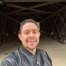 What are some reasonably priced campgrounds in or around Greenville, SC  that allow long-term camping?