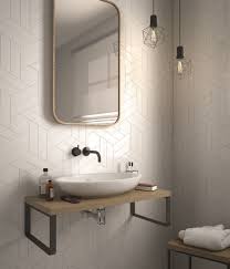 Now that you know exactly what they look like and how to use chevron patterns in your home, get creative with the most stylish zigzag idea! Chevron Ceramic White Matte Finish 2 X 8 Ceramic Wall Tile 4 19 Per Square Foot Beach Bathroom Decor Small Bathroom Paint Modern Bathroom Decor