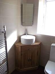 What is the cheapest option available within corner bathroom sinks? Corner Sink Corner Bathroom Vanity Bathroom Sink Units Small Bathroom