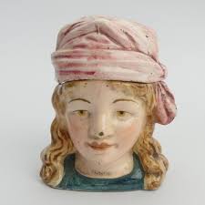 C.1920's ceramic tobacco jar head of a peasant girl the lid takes a sponge  to keep tobacco fresh, st