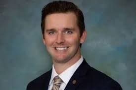 Man Pours Bucket of Gasoline