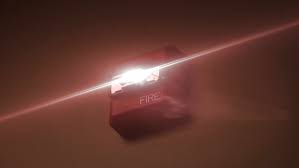 A smoke detector is a device that senses smoke, typically as an indicator of fire. Why Do Fire Alarms Flash Strobe Lights Instead Of Just Sounding An Alarm Quora