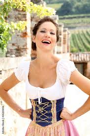 Braunhaarige Frau im Dirndl Stock Photo | Adobe Stock