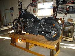 Diy home made wooden motorcycle lift stand table under $20, almost ready. Diy Craft Tutorials Step By Step Homemade Diy Motorcycle Lift