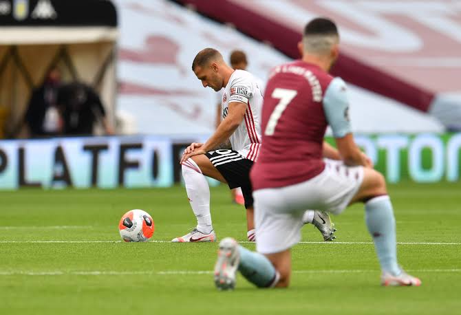 Players take a knee as Premier League restarts | Reuters
