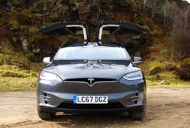 At first glance, having front doors that open and close on their own seemed needlessly complicated — just one more thing to break. Tesla Model X 100d Review Driving Torque