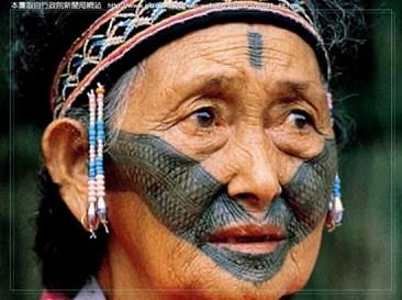An Atayal elder with traditional Ptasan facial tattooing., AI generated