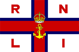 Red and yellow flags indicate the area patrolled by lifeguards. United Kingdom Royal National Lifeboat Institution