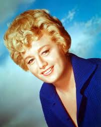 90 First & Last Shelley Winters in her First credited movie role as Gloria  Flynn (Sailor's Holiday 1944) & last role as Professor Summer (La Bomba  1999)
