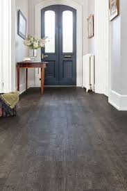 With A Deep Smoky Grey Tone And A Grain Packed Full Of Charm This Wood Effect Vinyl Plank Flo Grey Vinyl Plank Flooring Gray Wood Tile Flooring Vinyl Flooring