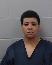 Raymond, Grace Renee was booked into the Hays County Jail