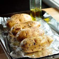 Here S How To Make An Absolutely Perfect Baked Potato Every Time Recipe Perfect Baked Potato Cooking Baked Potatoes Oven Cooking