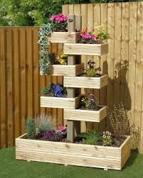 Woodworking Ideas Projects In 2020 Wooden Garden Planters Garden Projects Garden Planters