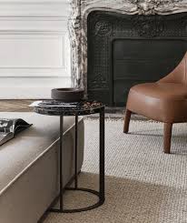Square, rectangular or circular to set in the centre of a room or next to the sofas, the lithos small tables have tops in portoro black marble, marquinia. Lithos