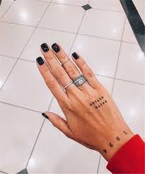 Discover pinterest's 10 best ideas and inspiration for one word tattoos. Coral Asymmetrical Top Hand Tattoos Tattoos For Guys Finger Tattoos
