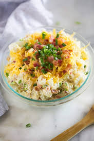 Add the potatoes and use a rubber spatula to gently combine with the sour cream mixture. Baked Potato Salad Recipe Tastes Better From Scratch