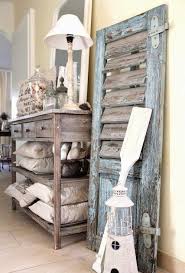 Coastal Decorating With Shutters Wall Decor More Rustic Beach House Decor Rustic Beach House Rustic Coastal Decor