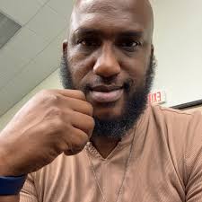 When did rhyno rejoin the wwe and why is he hanging around with Solo?