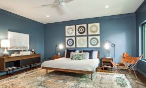 Example of a large 1960s master light wood floor bedroom design in orange county with gray walls and no fireplace. Inspiring Mid Century Modern Bedrooms With Exquisite Decors