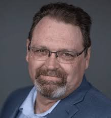 Chris Pulis as Group Chief Technology Officer