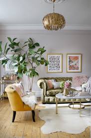 Here are some modern living room ideas and designs to inspire your next remodel a copper floor lamp complements a ceramic pink pendant light. The Reveal Of Our Living Room Refresh Swoon Worthy