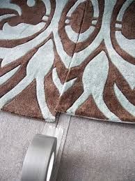 How to choose the perfect area rug for your room. How To Make One Large Custom Area Rug From Several Small Ones Custom Area Rugs Diy Rug Small Rugs